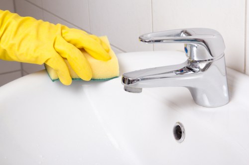 Technician cleaning office upholstery in SW6